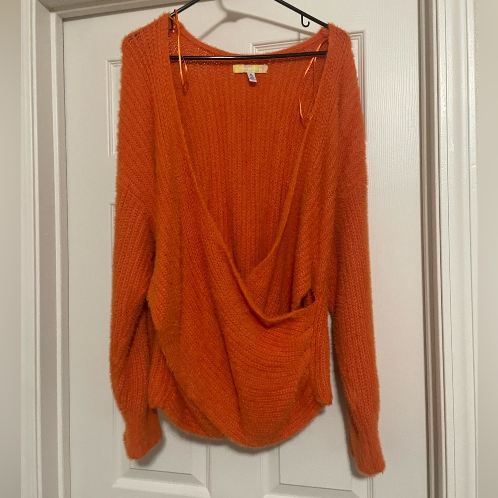 Orange fuzzy sweater